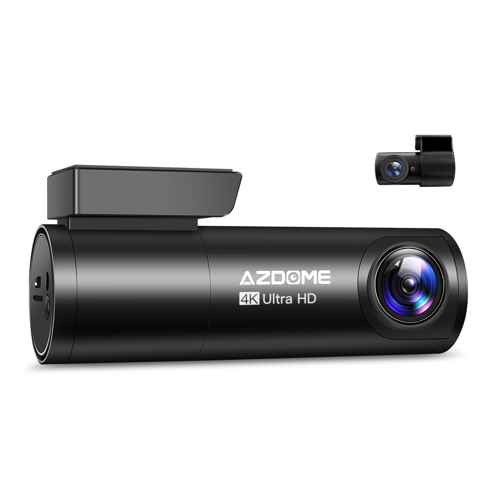 Front view of the Azdome M300S dashcam, showcasing its compact design with a black body, a lens at the center, and buttons on the side for easy navigation. The device features a small LCD screen and is mounted on a vehicle’s windshield