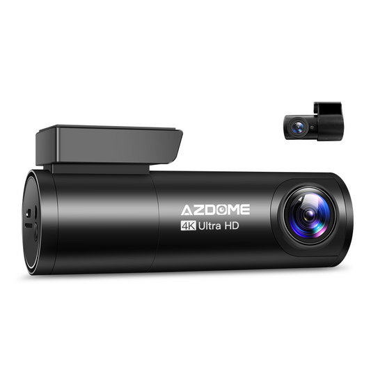Front view of the Azdome M300S dashcam, showcasing its compact design with a black body, a lens at the center, and buttons on the side for easy navigation. The device features a small LCD screen and is mounted on a vehicle’s windshield