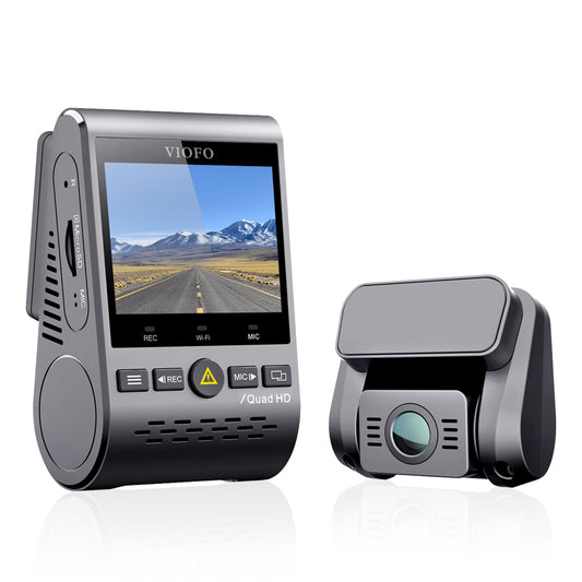 Close-up of the VIOFO A129 PLUS 2K DUO dashcam system, showing both the front and rear cameras. The front camera has a 2K lens, housed in a small, rectangular black unit with an LCD screen for easy viewing. The rear camera is similarly compact, designed to be mounted at the back of the vehicle for capturing rear-facing footage. The system is sleek and modern, with intuitive controls and a discreet appearance
